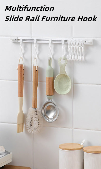 🥳2026 HOT SALE🥳💞50K+ SOLD!🧺🔧 50% OFF! Multifunctional Slide Rail Hook – Punch‑free installation, adjustable hook spacing. Holds utensils, towels & robes – no wall damage! 🏠✨