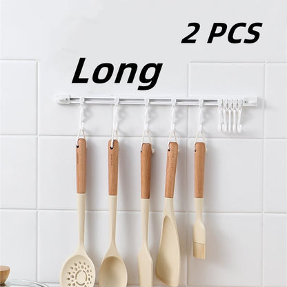 🥳2026 HOT SALE🥳💞50K+ SOLD!🧺🔧 50% OFF! Multifunctional Slide Rail Hook – Punch‑free installation, adjustable hook spacing. Holds utensils, towels & robes – no wall damage! 🏠✨